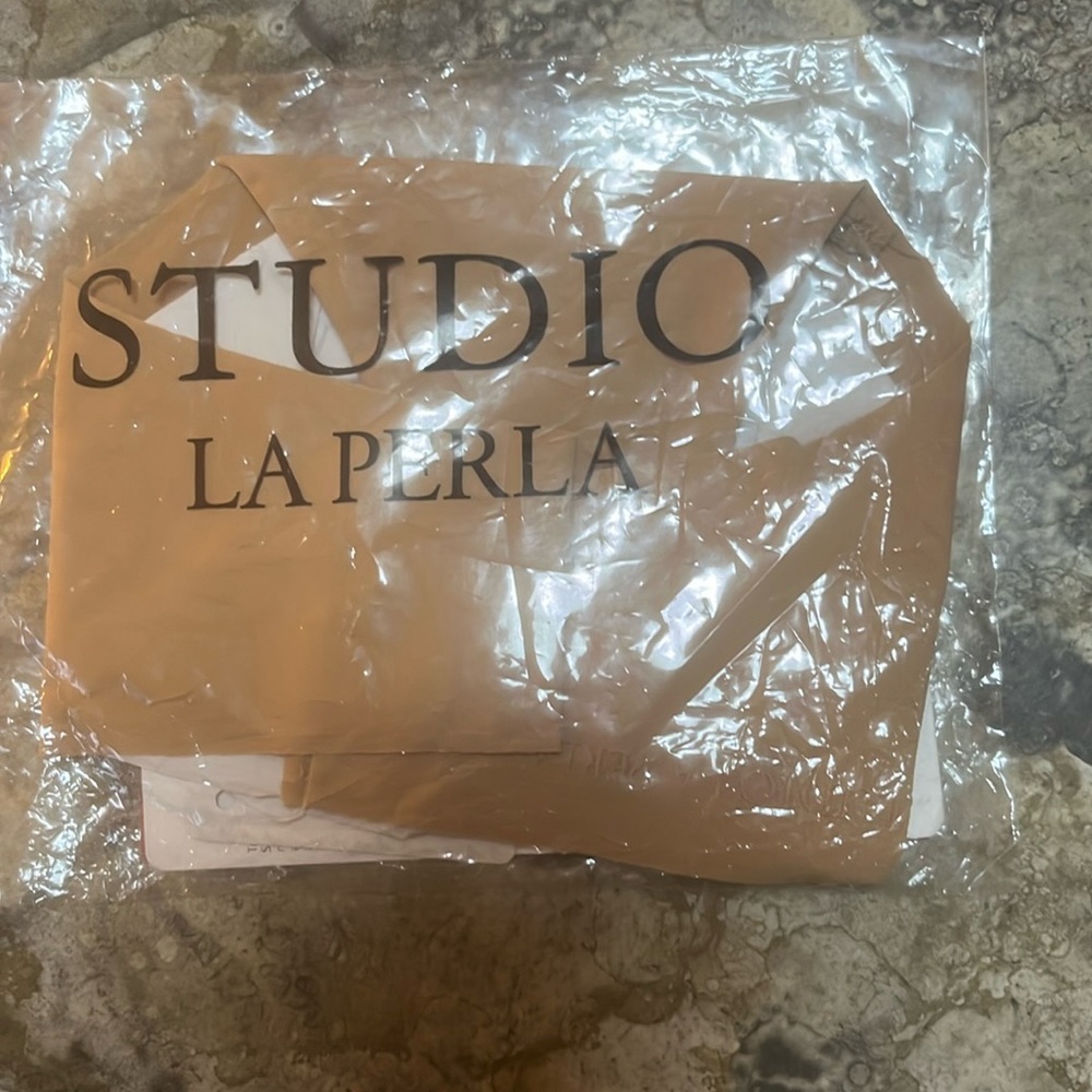 Fresh in the plastic, new with tags and waiting to be worn by you!
